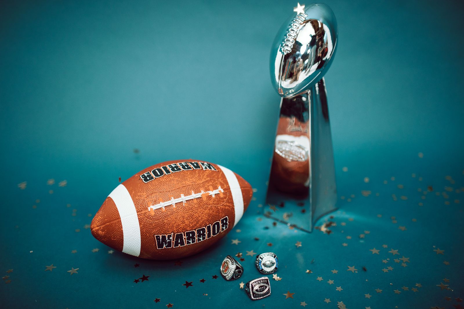 Fantasy football championship trophy and rings